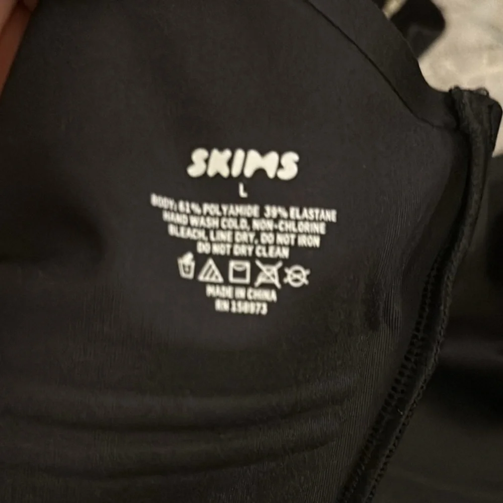 NWT- Skims. Recycled swim. Scoop neck one‎ piece. Onyx/Black.